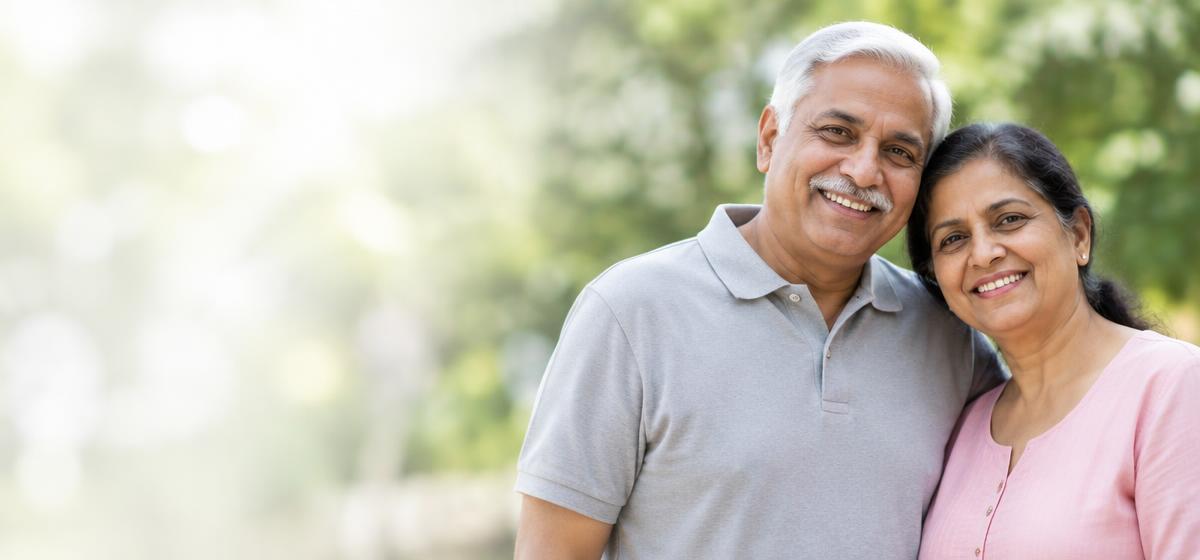 Smiling older couple outdoors, representing advanced health screening